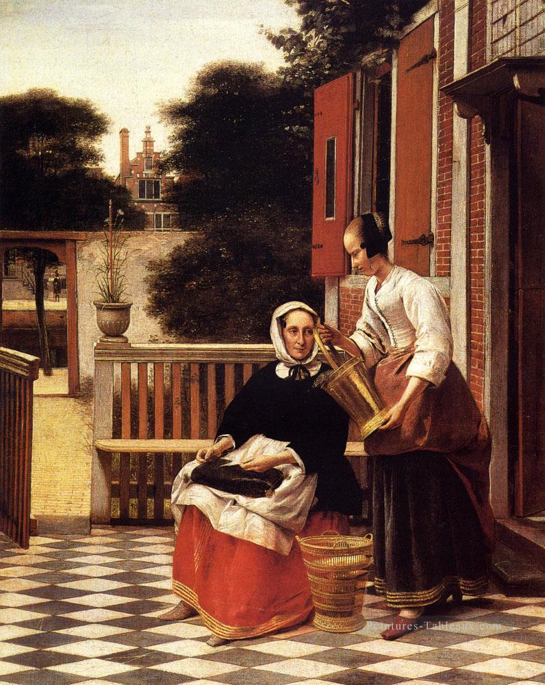 Femme et maid avec un pail dans un genre de cour Pieter de Hooch Peintures à l'huile